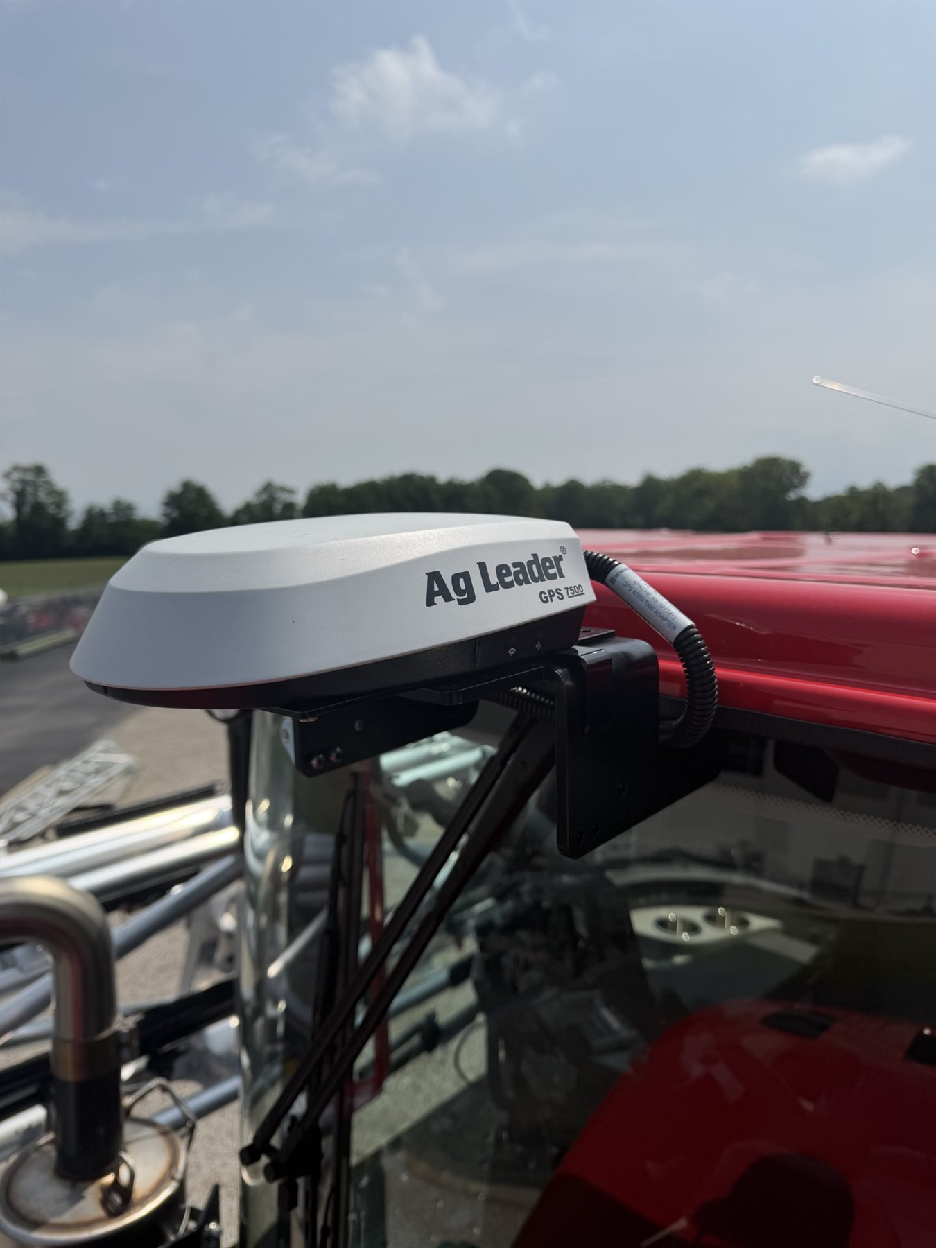 Ag Leader GPS 7500 receiver mounted on an Apache cab